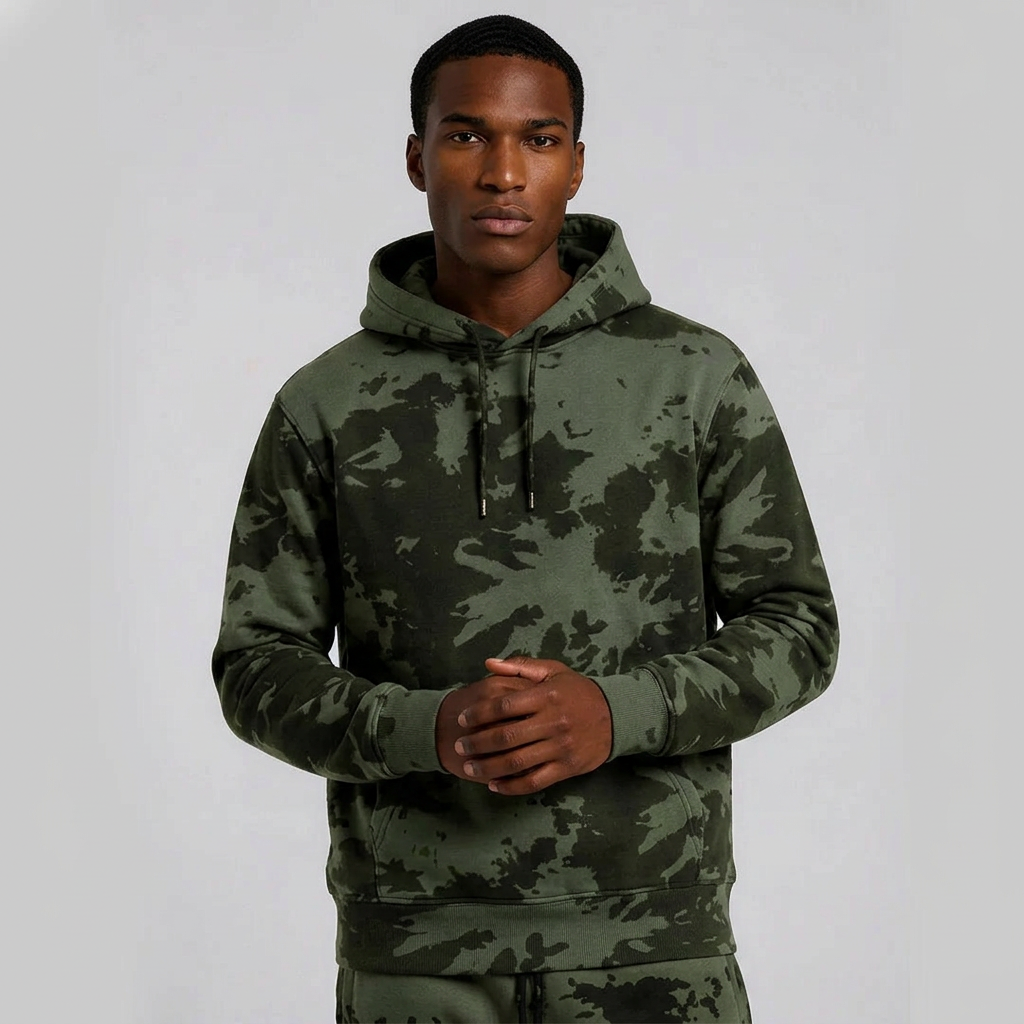 Model wearing the olive tie-dye heavyweight hoody, upper-half view